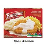 Banquet&nbsp;&nbsp;chicken fried beef steak meal covered in gravy with mashed potatoes and corn Center Front Picture